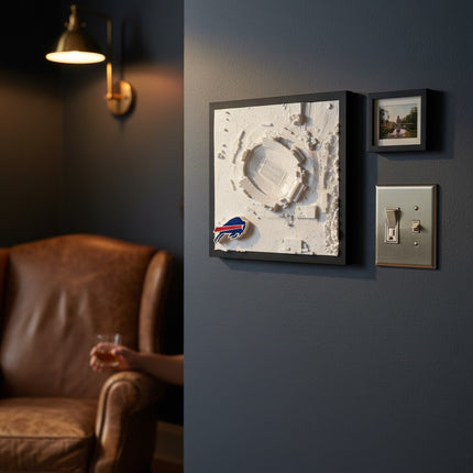 Buffalo Bills — Highmark Stadium 3D Topographical Wall Art with black frame, displayed in a moody lounge setting